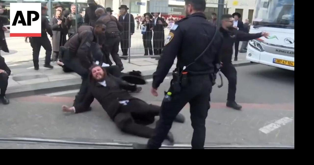 Jerusalem police drag ultra-Orthodox Jewish men protesting military enlistment