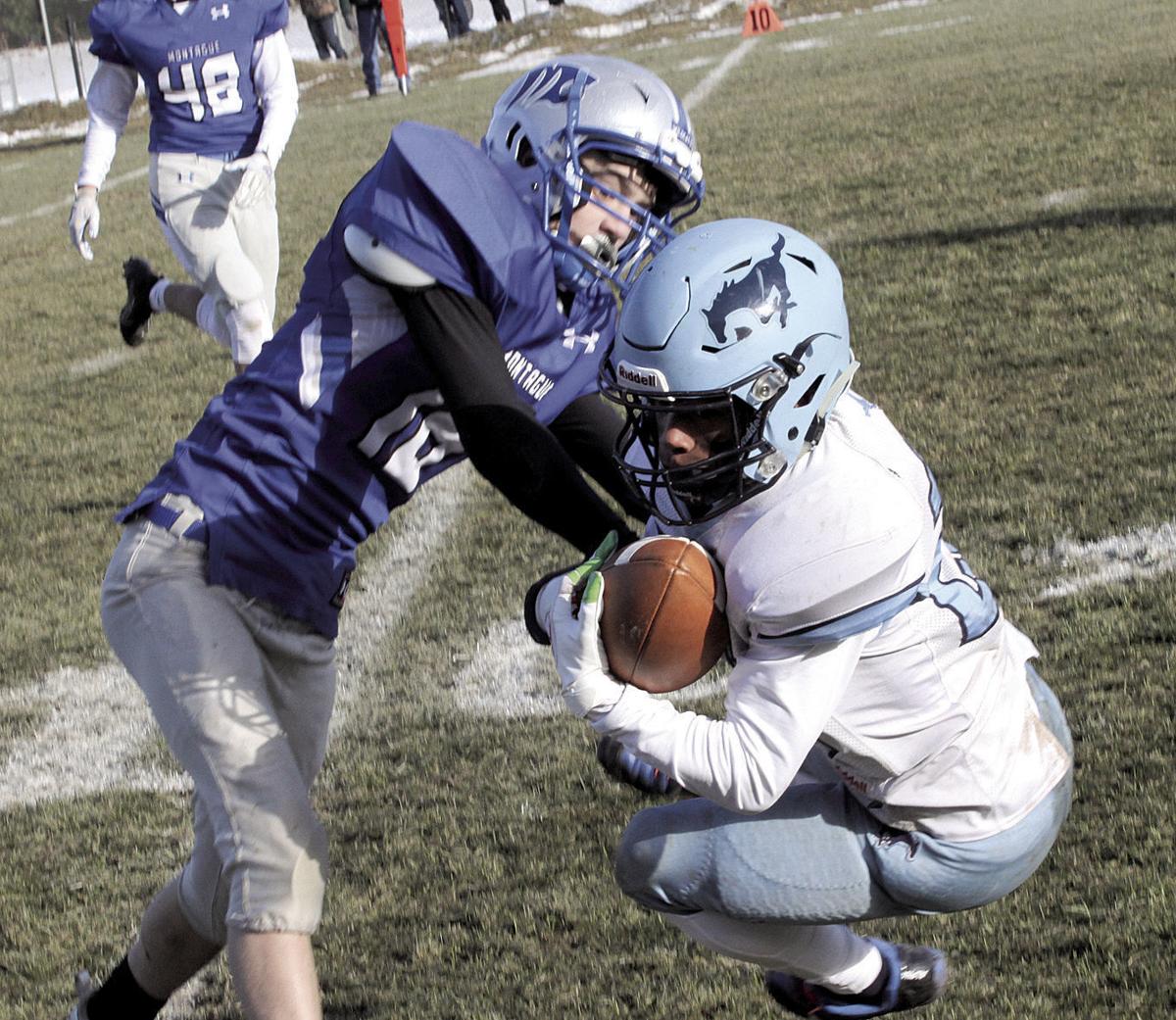 Montague Football Dominates Sanford Meridian For Regional Title
