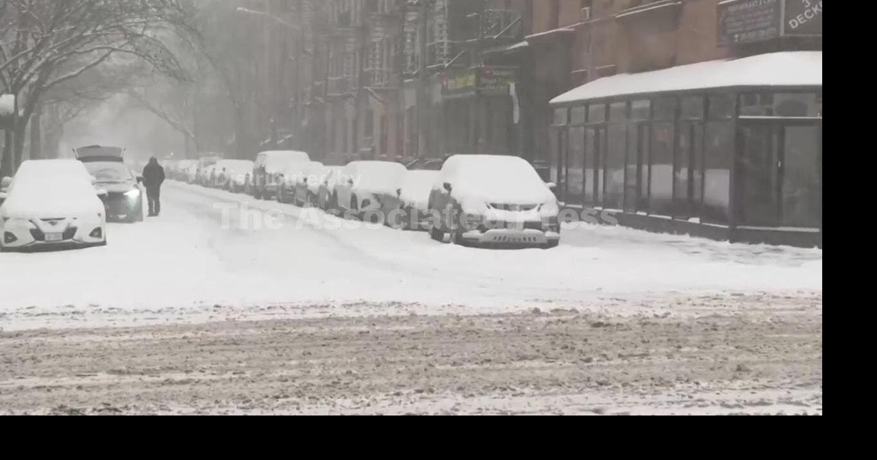 Massive winter storm brings widespread snow and significant travel disruption to New York