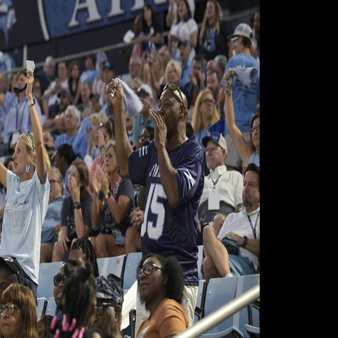 college football fans cheering