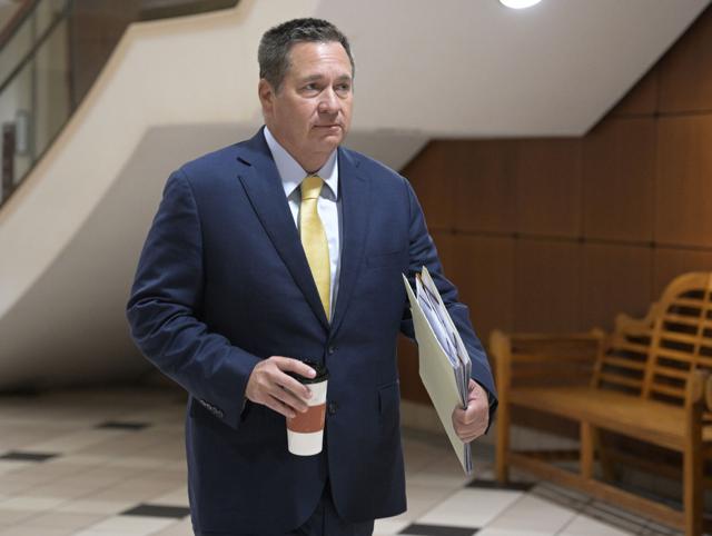 Attorney J Dhu Thompson going to courtroom