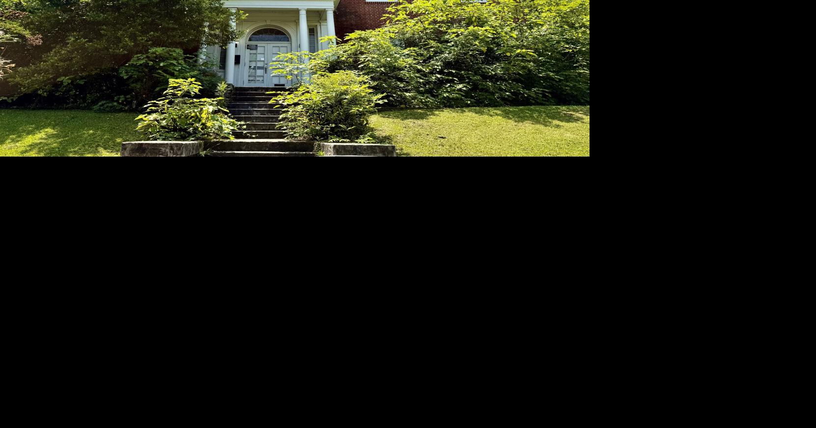 The red brick house on Baton Rouge's North Street is obscured by trees today. What's its story?