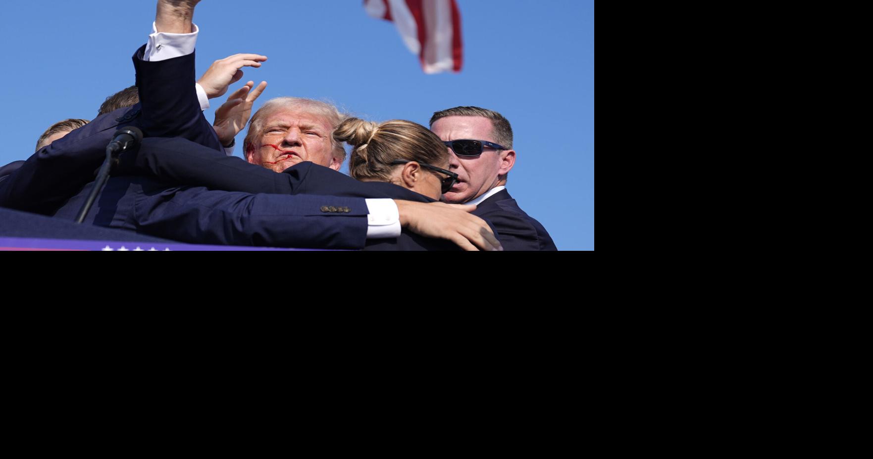 After gunshots, Donald Trump whisked off stage at rally | News ...