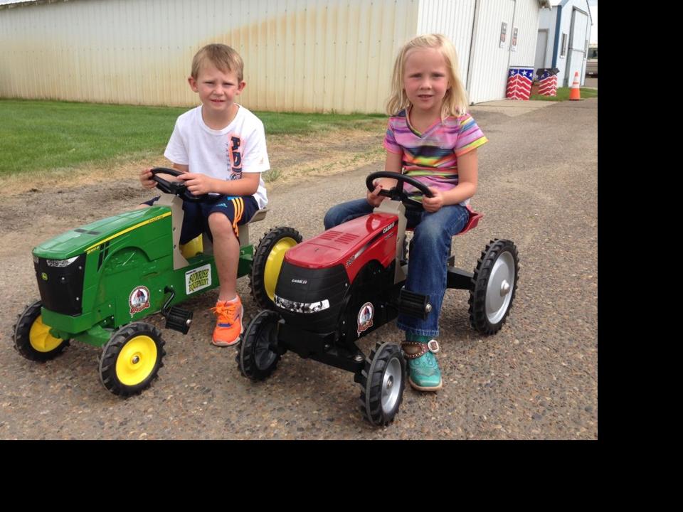 Children compete in pedal tractor pull Local News Stories