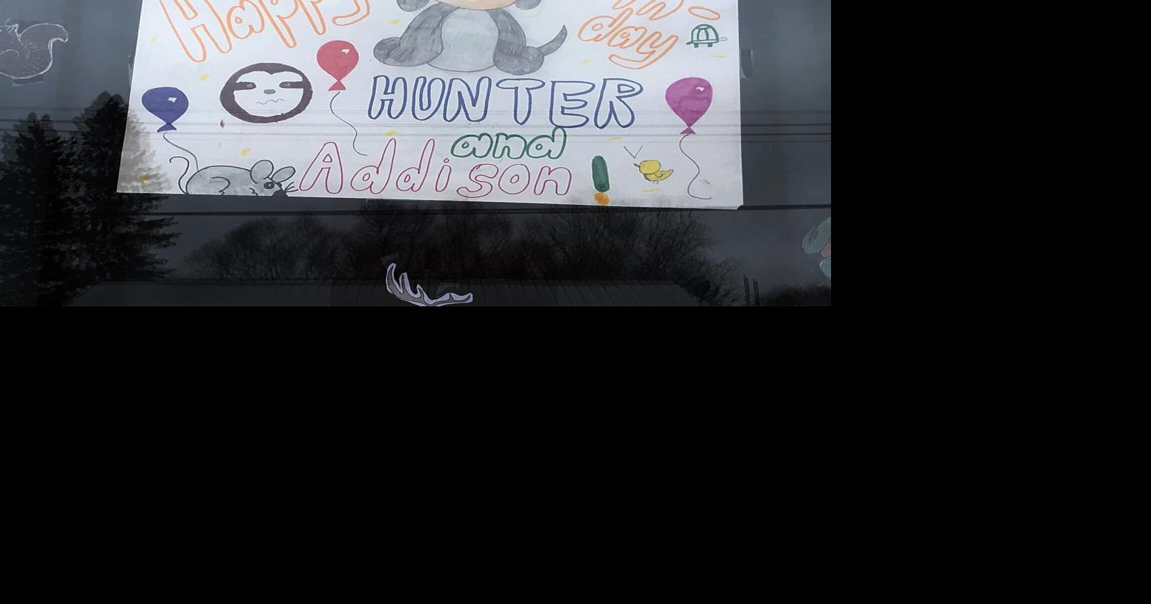 Nottawa neighbours use windows to wish kids happy birthday during