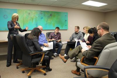 siouxland business leaders students tackle federal budget in mock