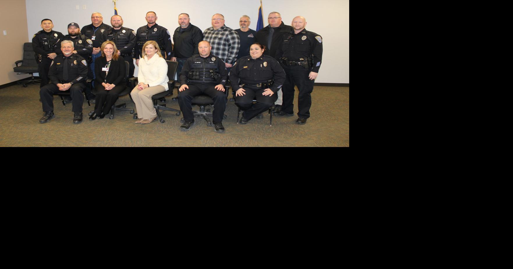South Sioux City police present donations to Nylen Cancer Center