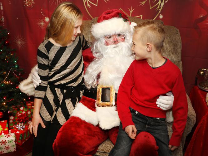 Giving back Santa and helpers return the gift in Ida Grove