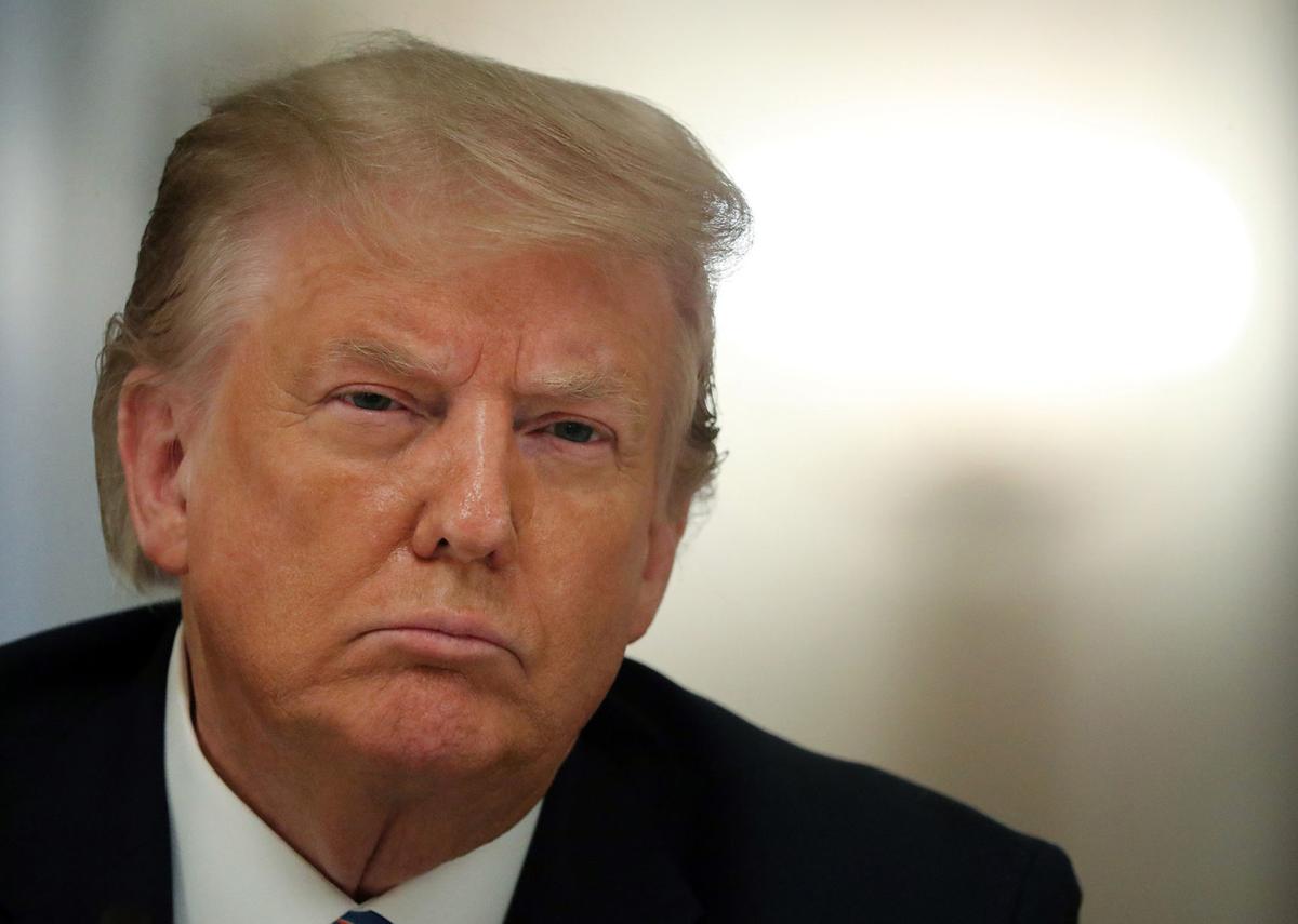 'Pleading' from aides led to Trump agreeing -- after months -- to wear a mask