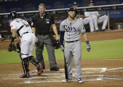 Rays hang on to down Marlins 4 3