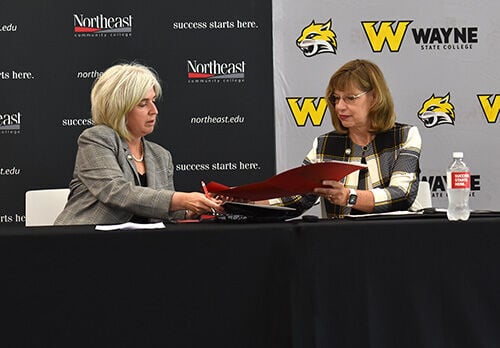 Northeast, Wayne State presidents sign agreement