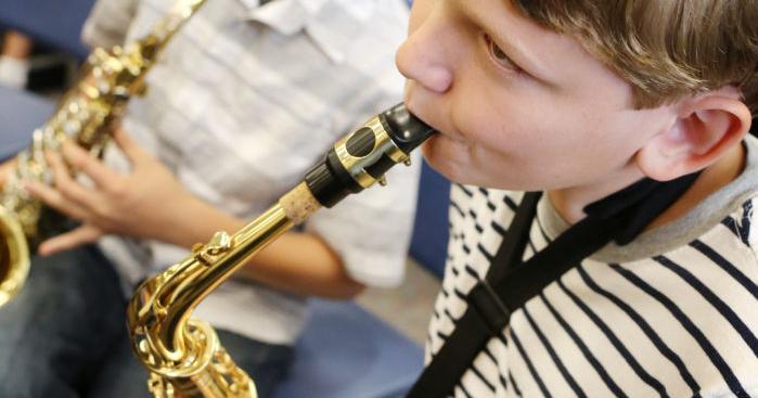 Banding together: Students choose musical instruments to suit their ...