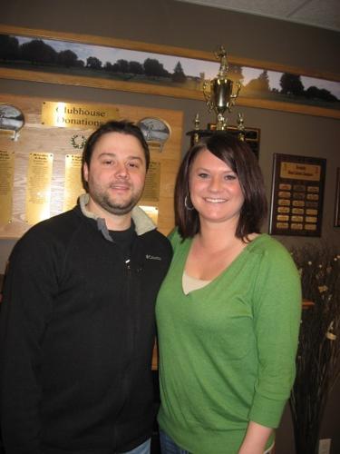 Taylor and Monica Doeschot, who manage Doosky's East, stand in the foyer of the restaurant and bar, which opened last fall in Kingsley  
