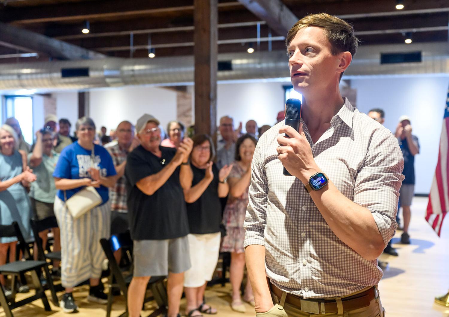 Rob Sand derides 'broke' two-party system, calls out opponent for being an 'operative'