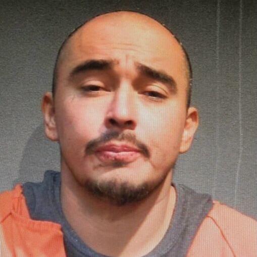 Man charged with breaking window at Sioux City federal building