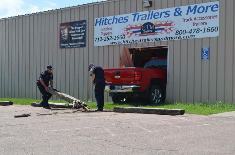 Man crashes truck through window of Highway 75 business