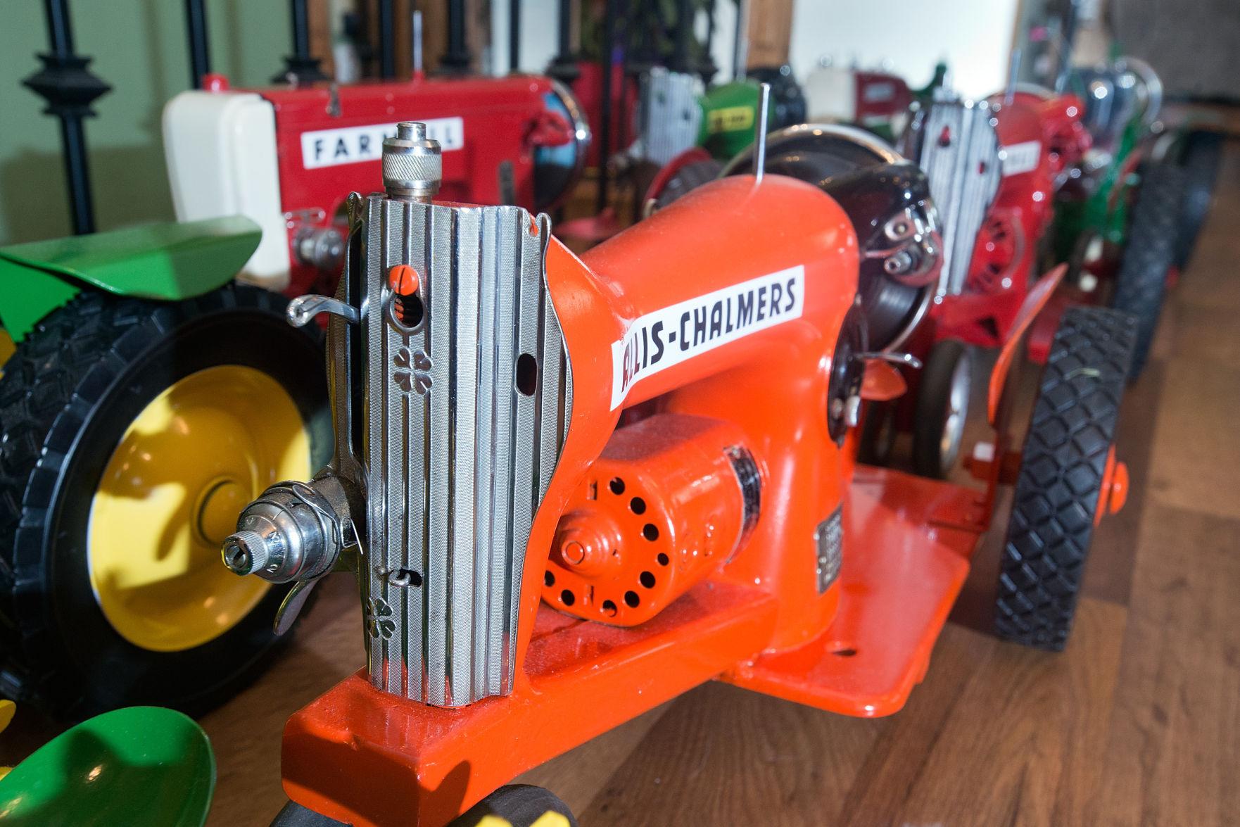 Craftsman turns sewing machines into tractors