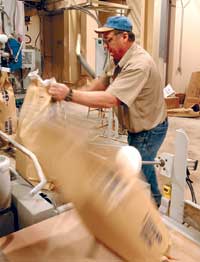 Consumer Distributing Co. keeps expanding, works on own animal feed line 