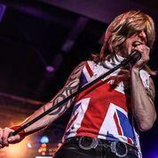 hairball singer at mic
