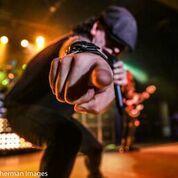hairball singer pointing