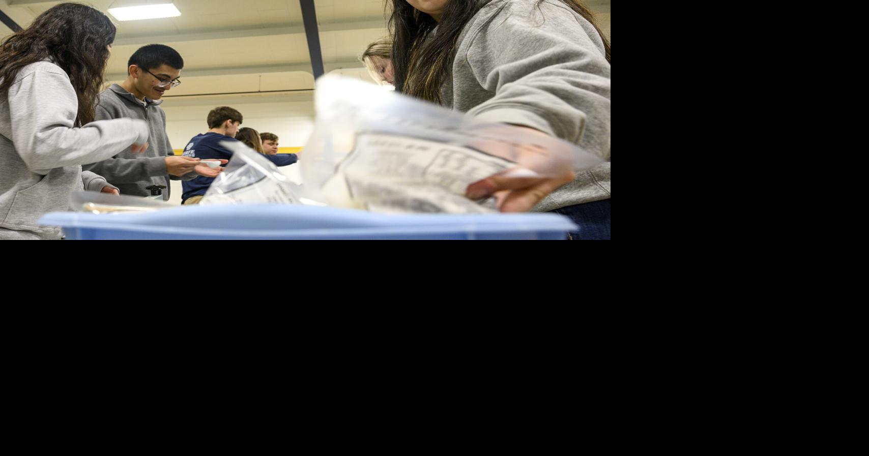 Bishop Heelan students help make meals for Honduras