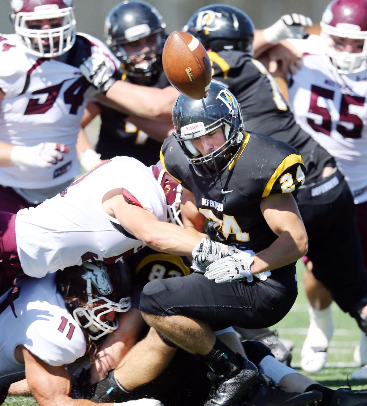 Seven first-quarter turnovers doom Dordt against Mustangs ...