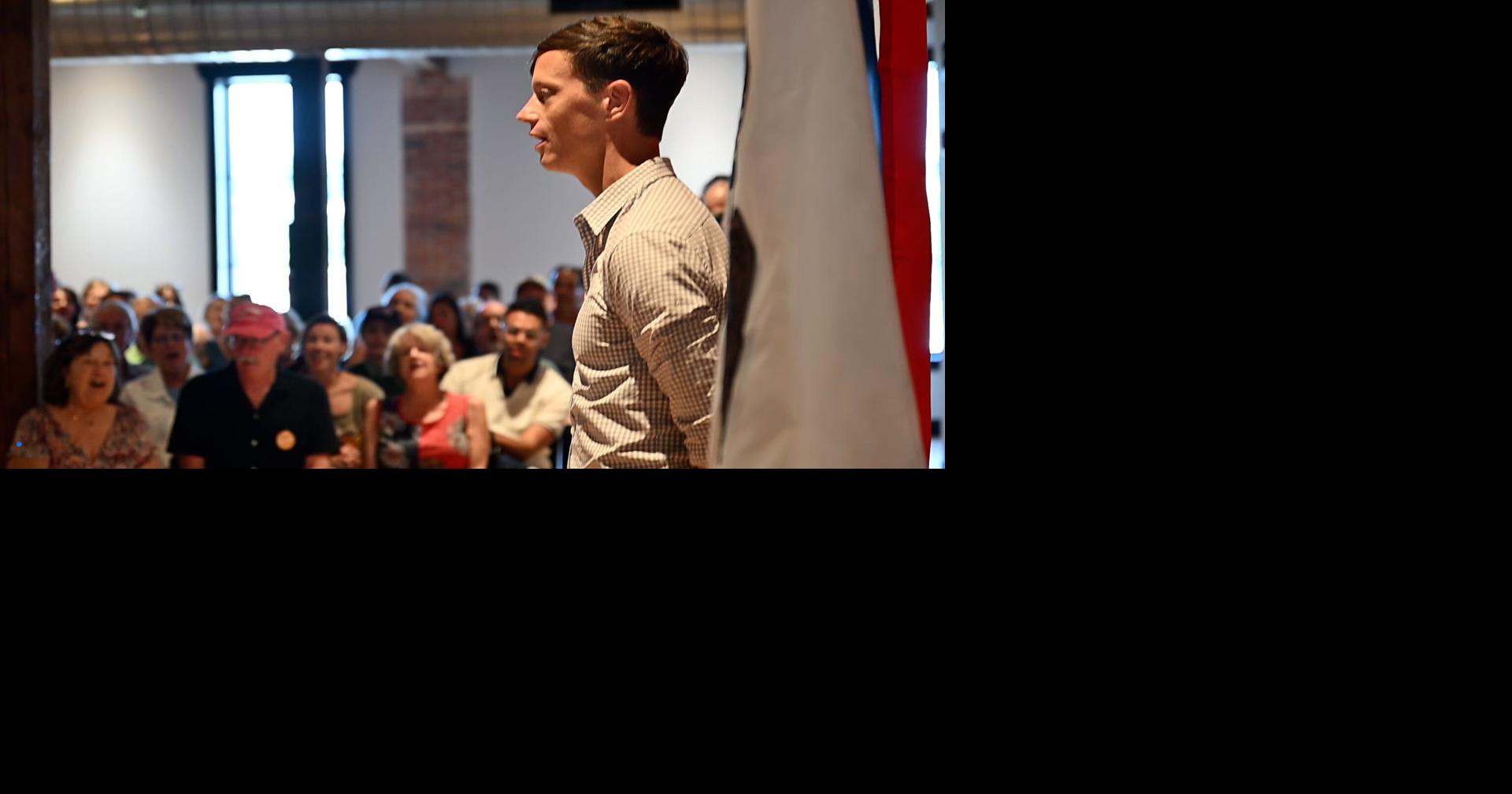  Candidate Rob Sand leads singing of 