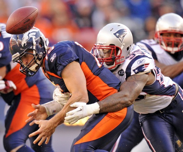 Tebow, Broncos meet match; Patriots clinch playoff bid