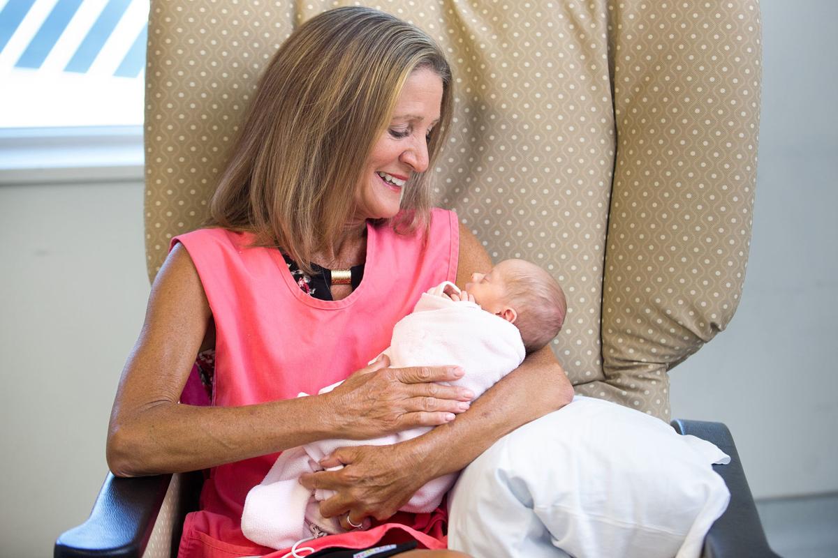 St. Luke's baby cuddlers give comfort, receive joy Local Lifestyles