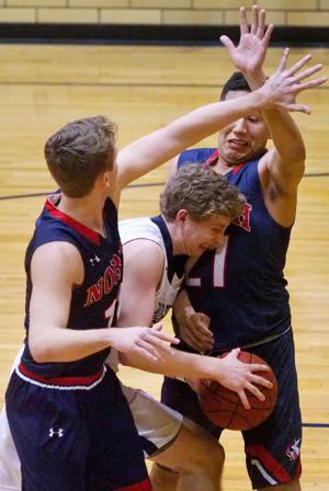 Photos: North at Heelan basketball