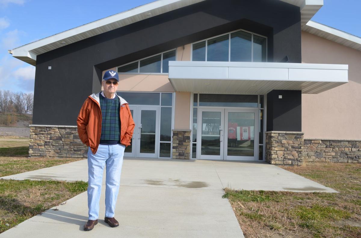 Mike Newhouse in front of Siouxland Freedom Park welcome center