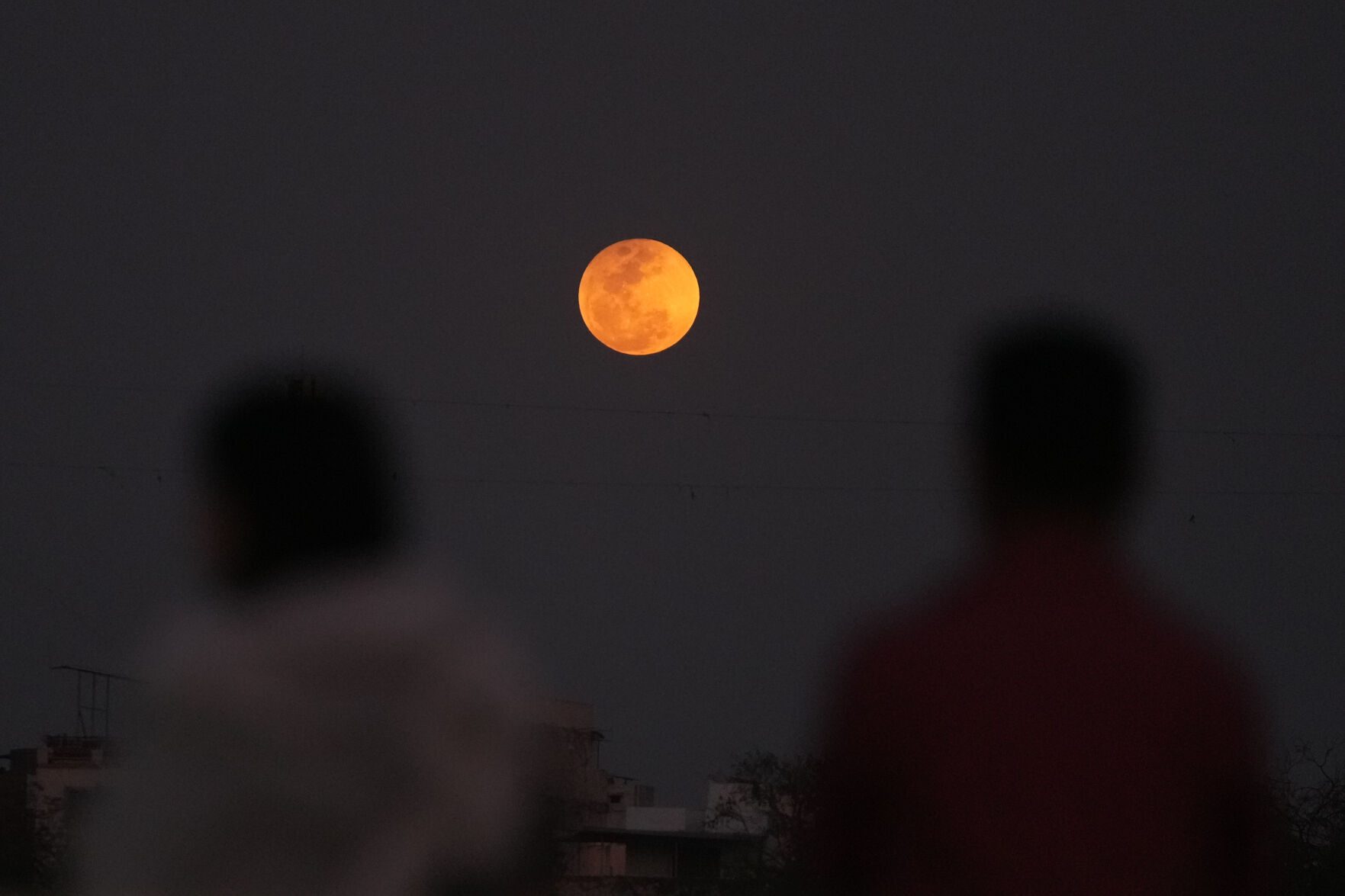 Photos show the March 2026 blood moon and total lunar eclipse around ...