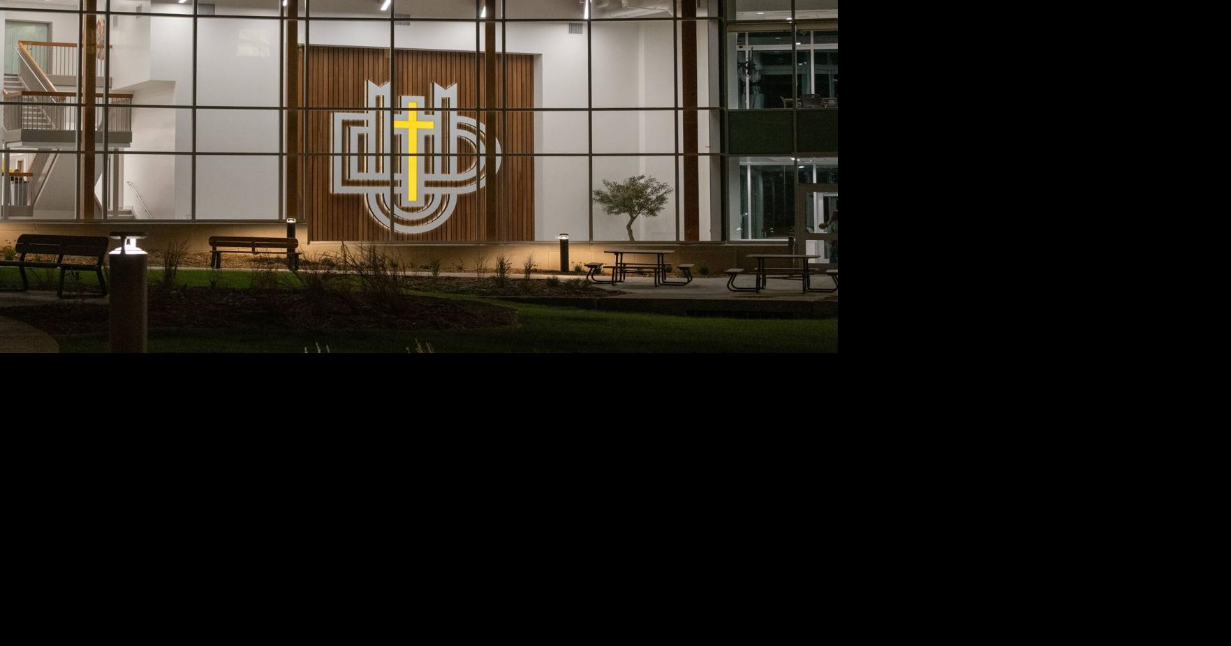 Dordt atrium has glowing logo crafted by student, father