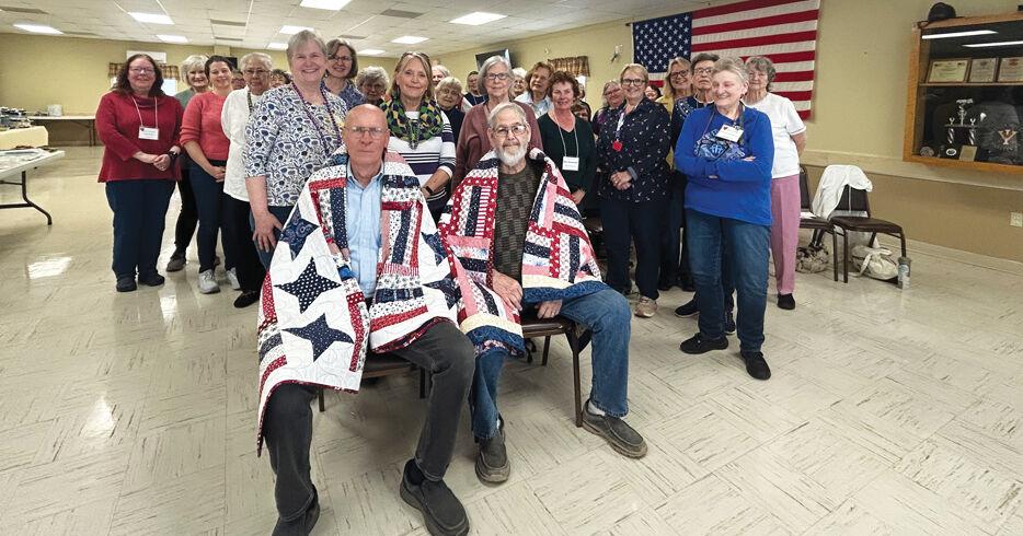 Lake Quilters Guild at SML celebrates 36 years; honors former first responders with handmade quilts