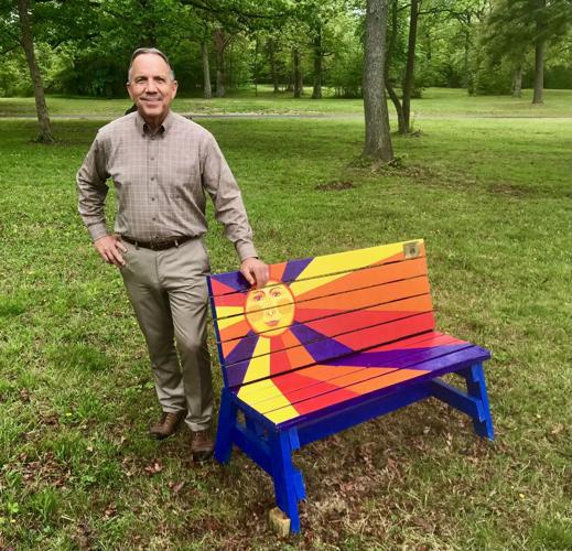 Art Shepherd with painted park bench