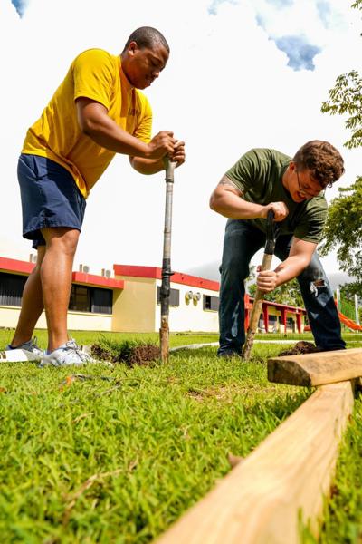 Waldorf sailor helps build swing set in Guam