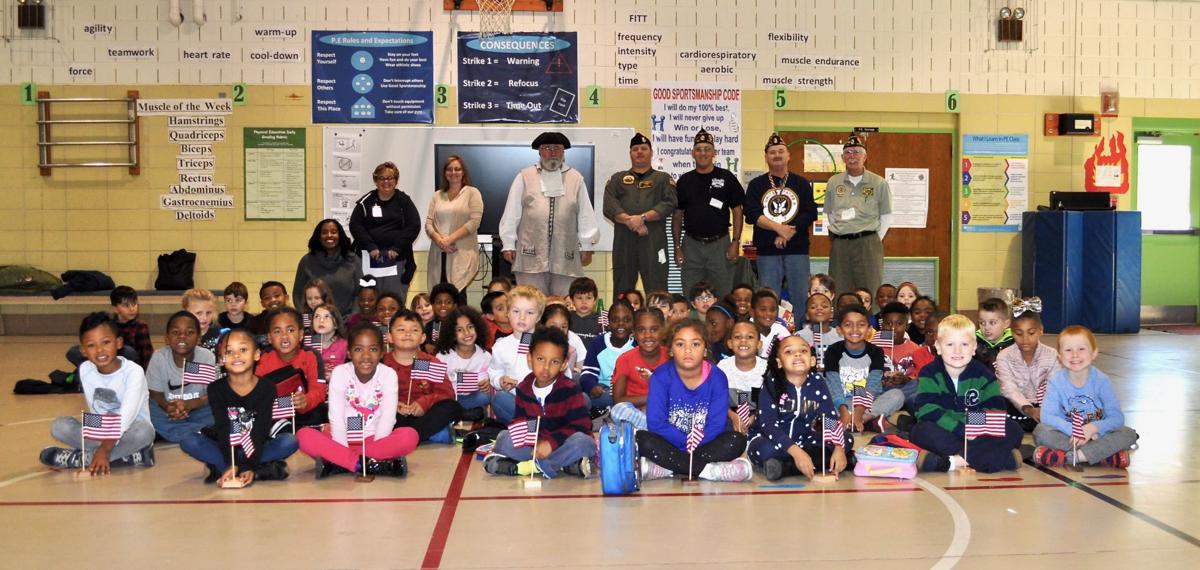 St. Mary’s American Legion provides flags for first graders Features