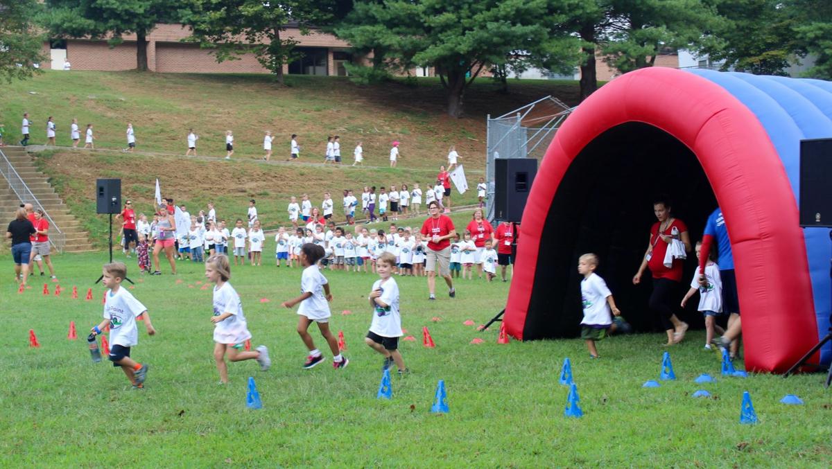 Fun run raises 21,000 Features