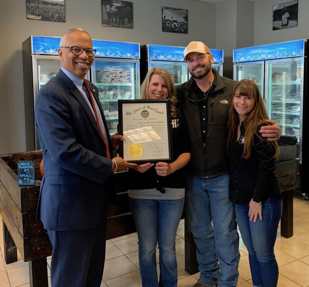 Lt. Gov. Boyd Rutherford presents award citations to La Plata businesses