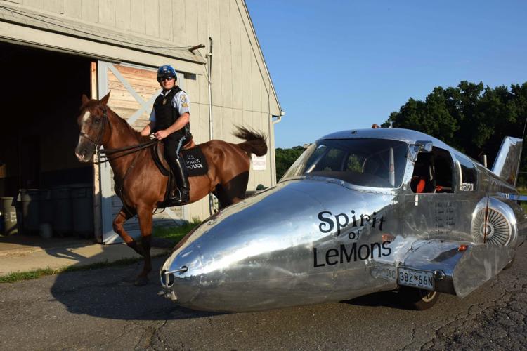 Local Park Policeman showcases car plane on the motor speedway and