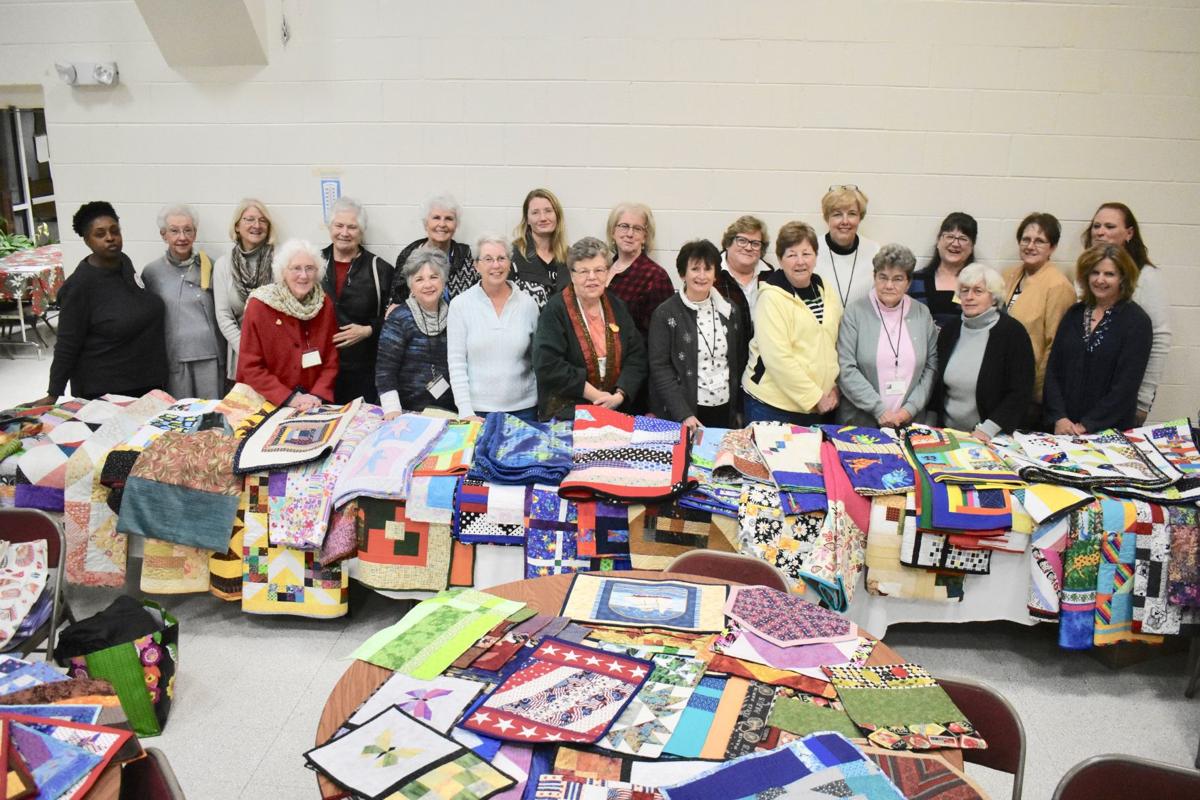 Quilting guild minds its P's (placemats) and Q's (quilts) Spotlight