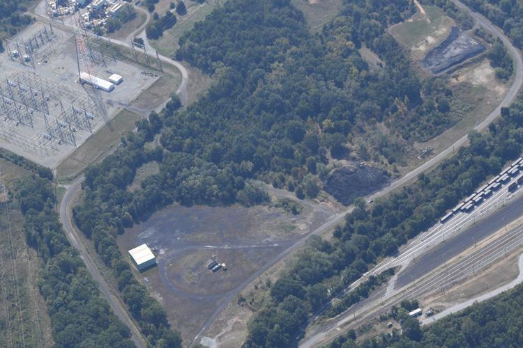 power plant cited for illegal dumping Local