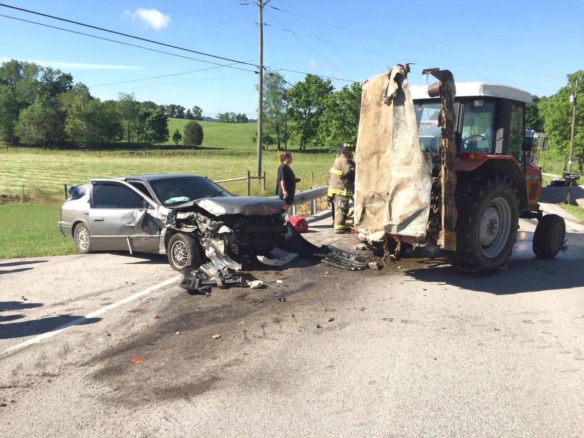 Three injured when car collides with tractor News