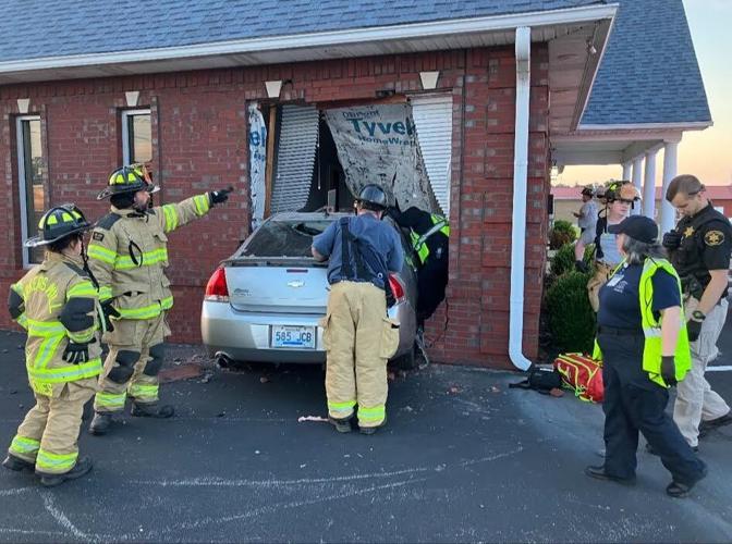 Car crashes into real estate office