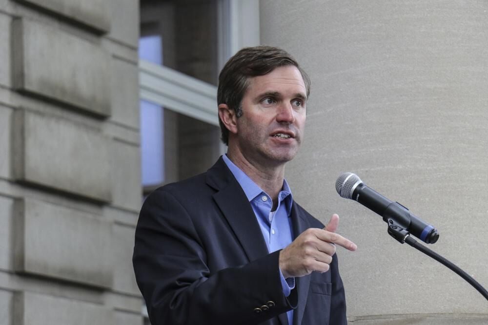 Beshear campaigns in west Louisville, says every neighborhood should see  'new prosperity