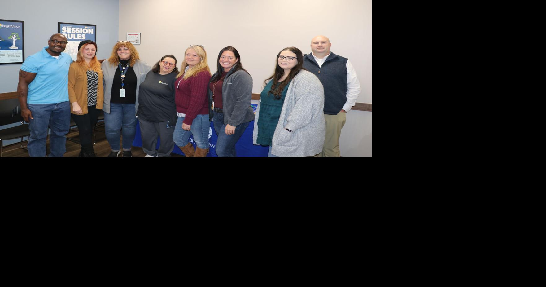 BrightView employees pose for anniversary