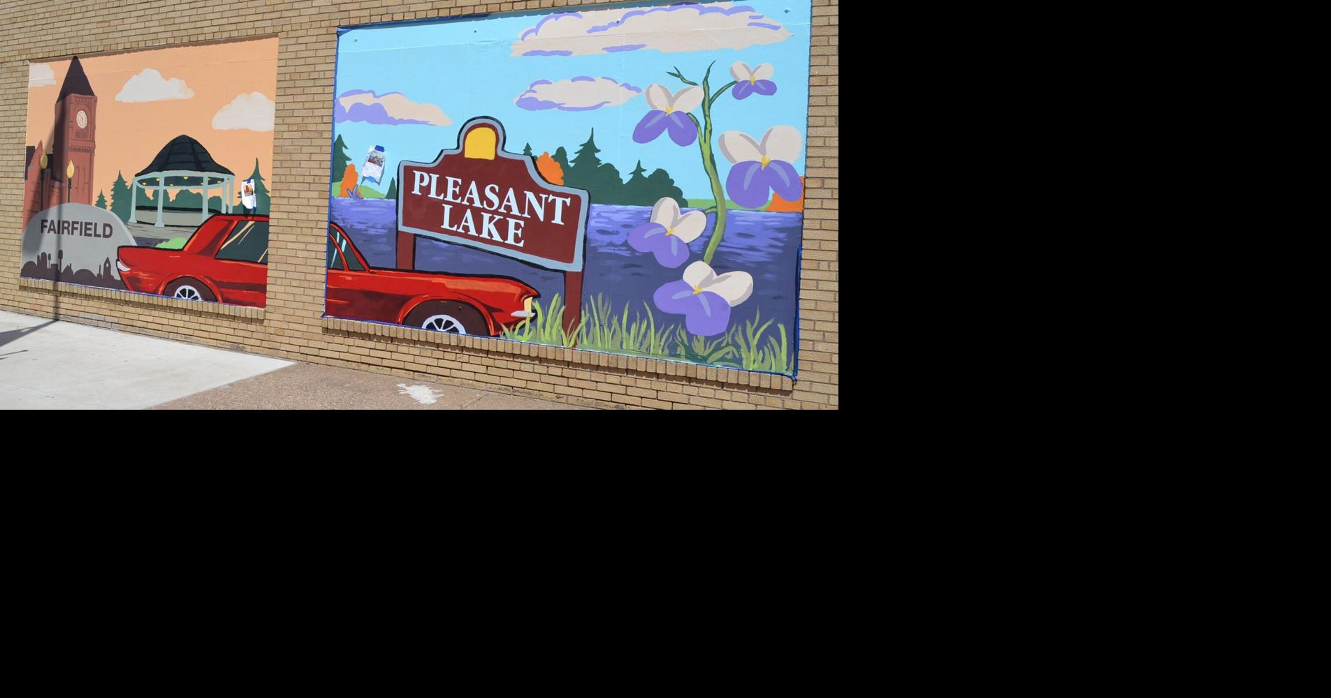Youth paint mural depicting Fairfield’s landmarks, ecology