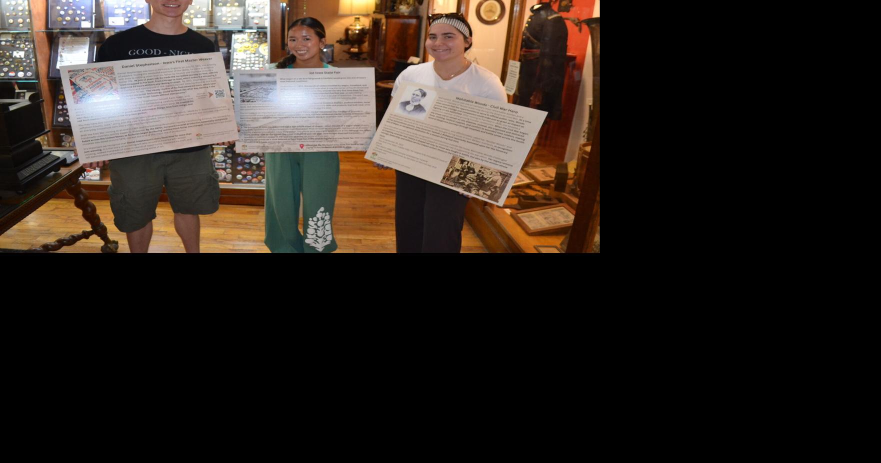 Visitors bureau interns create informative signs for Carnegie Museum