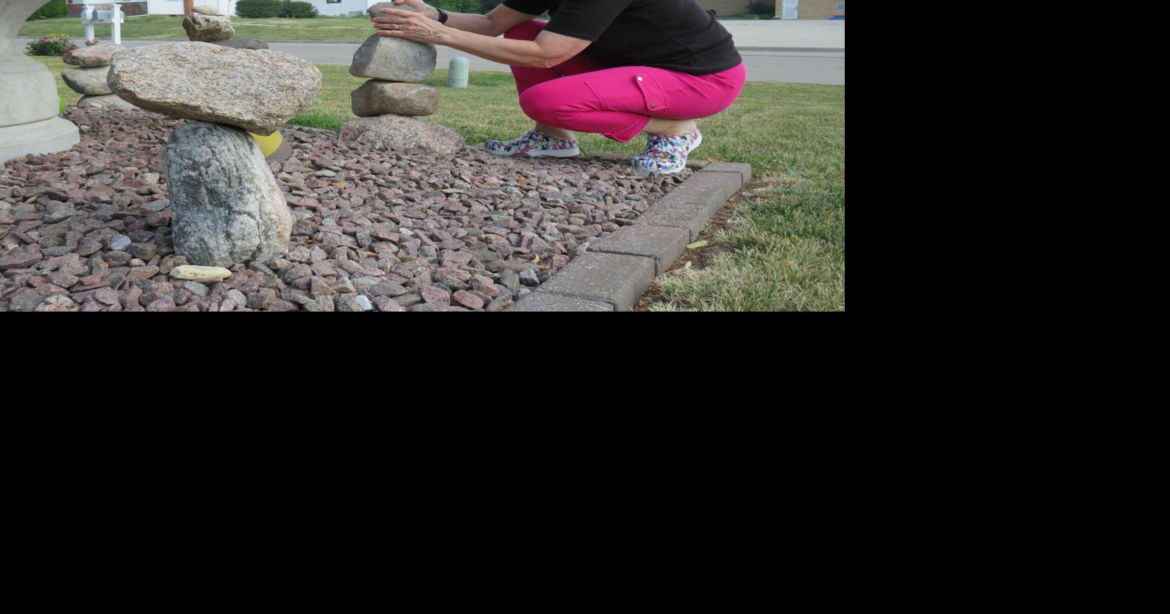 Flowers, stacked rocks mark unusual lawn in Washington | News ...