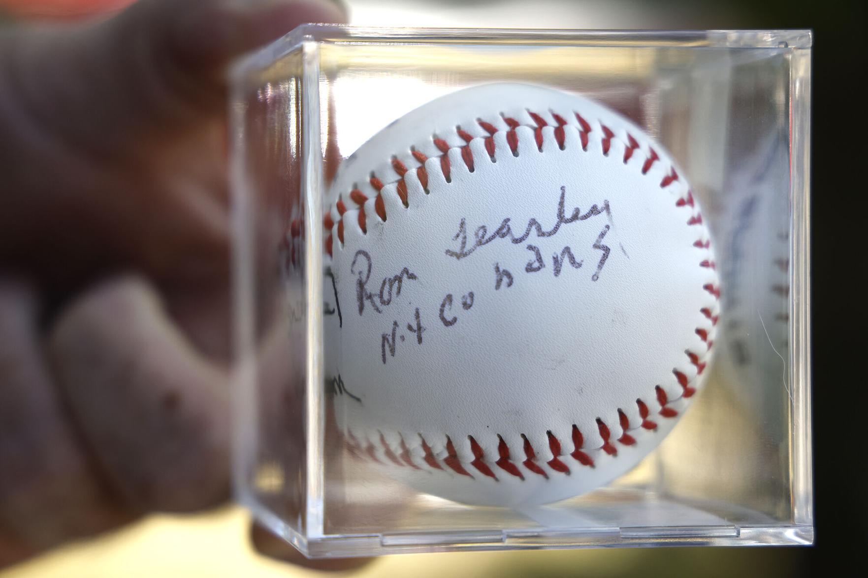 Tournament features auction with items signed by oldest-surviving Negro ...